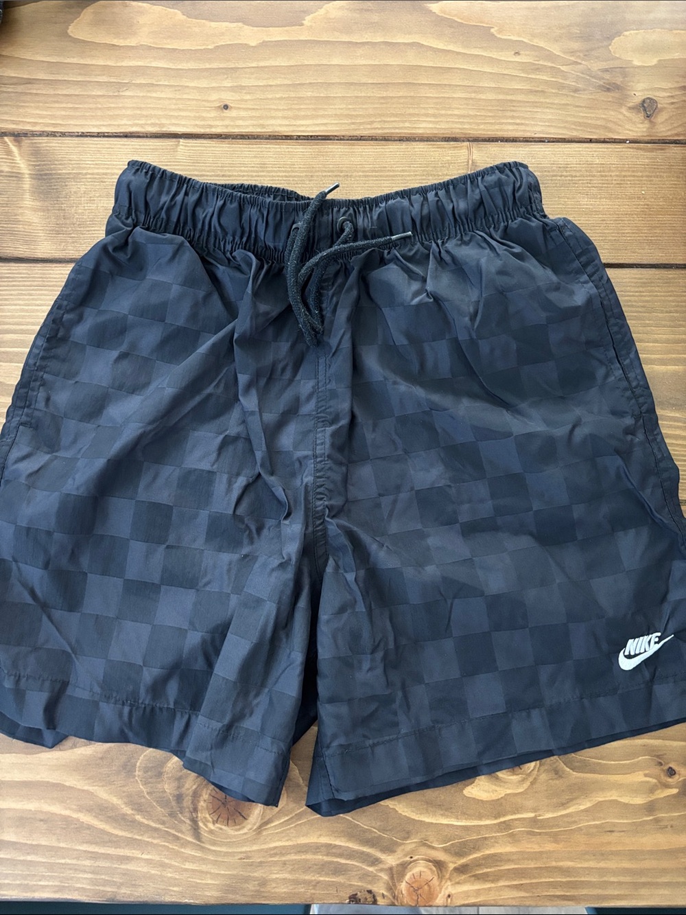 Nike Black Checkerboard Shorts with White Swoosh
